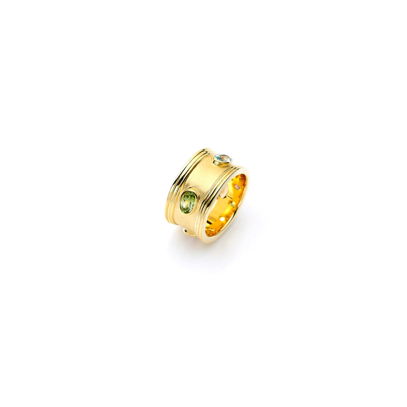 Gold and precious stones ring, jewellery designer, peridot, ruby, citrine, topaz